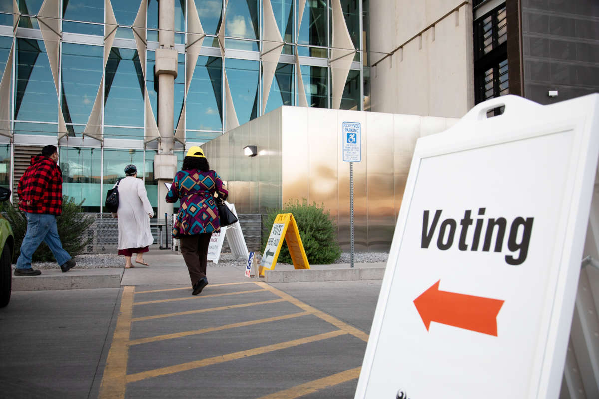 Voters enter Burton Barr Central Library to cast their ballots on November 3, 2020, in Phoenix, Arizona.