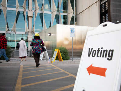 Voters enter Burton Barr Central Library to cast their ballots on November 3, 2020, in Phoenix, Arizona.