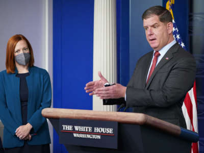 Secretary of Labor Marty Walsh, with White House Press Secretary Jen Psaki, speaks during the daily press briefing on April 2, 2021, in the Brady Briefing Room of the White House in Washington, D.C.