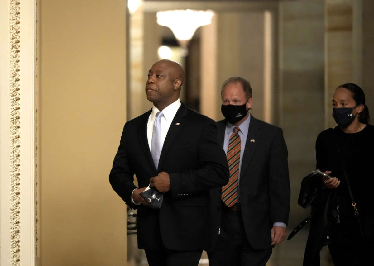 Sen. Tim Scott walks through the U.S. Capitol before he delivers the republican response to President Biden's address to congress on April 28, 2021, in Washington, D.C.