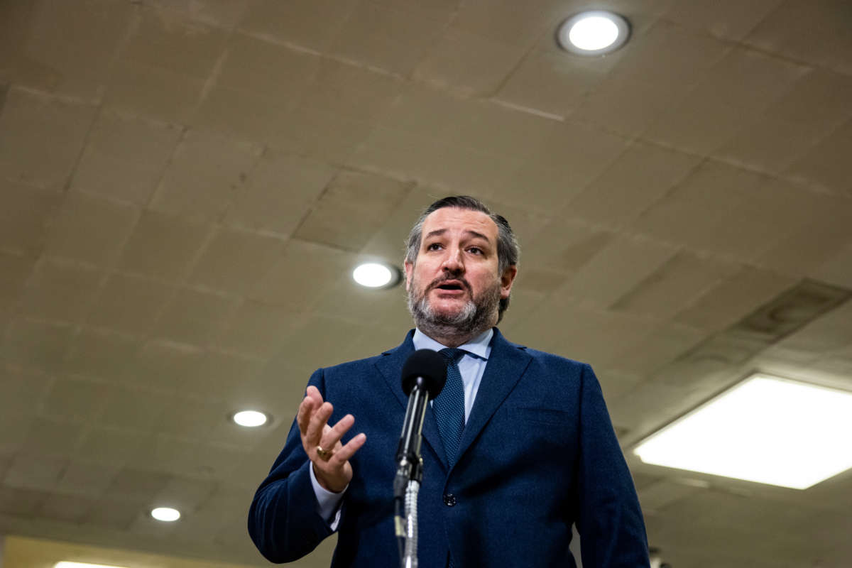 Senator Ted Cruz talks to reporters in the Senate subway on February 13, 2021, in Washington, D.C.