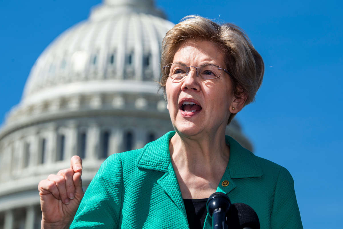 Sen. Elizabeth Warren conducts a news conference outside the Capitol on April 27, 2021.