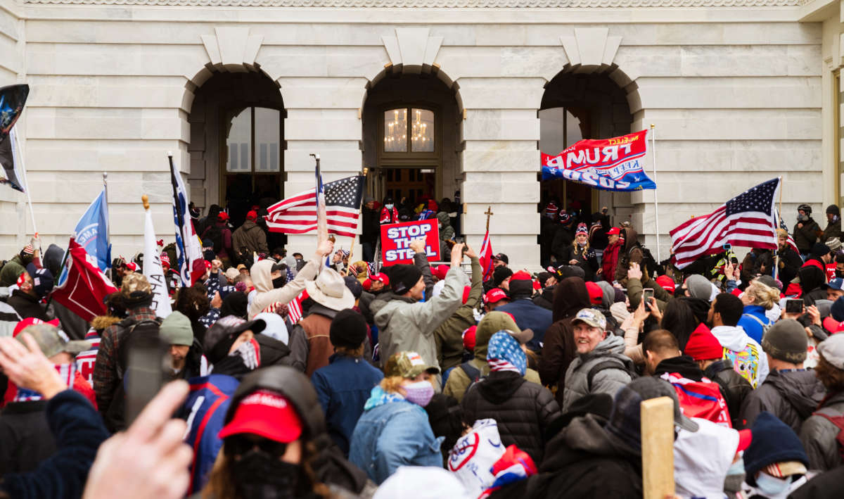 Trump supporters flood into the Capitol Building after breaking into it on January 6, 2021, in Washington, D.C.