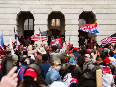 Trump supporters flood into the Capitol Building after breaking into it on January 6, 2021, in Washington, D.C.