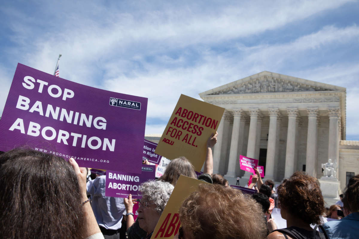 Abortion rights activists gather outside the U.S. Supreme Court on May 21, 2019, in Washington, D.C.