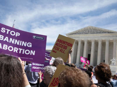 Abortion rights activists gather outside the U.S. Supreme Court on May 21, 2019, in Washington, D.C.