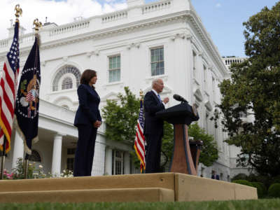 President Joe Biden delivers remarks on the COVID-19 response and vaccination program as Vice President Kamala Harris listens in the Rose Garden of the White House on May 13, 2021, in Washington, D.C.