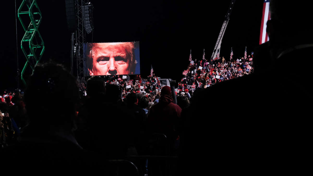 Hundreds of people attend a then-President Trump rally in support of Sen. David Perdue and Sen. Kelly Loeffler on December 5, 2020, in Valdosta, Georgia.
