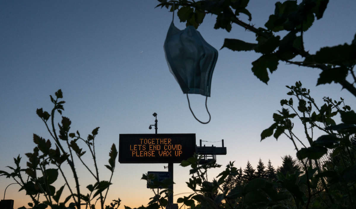 A digital highway sign promotes COVID-19 vaccination on May 14, 2021, in Vancouver, Washington.