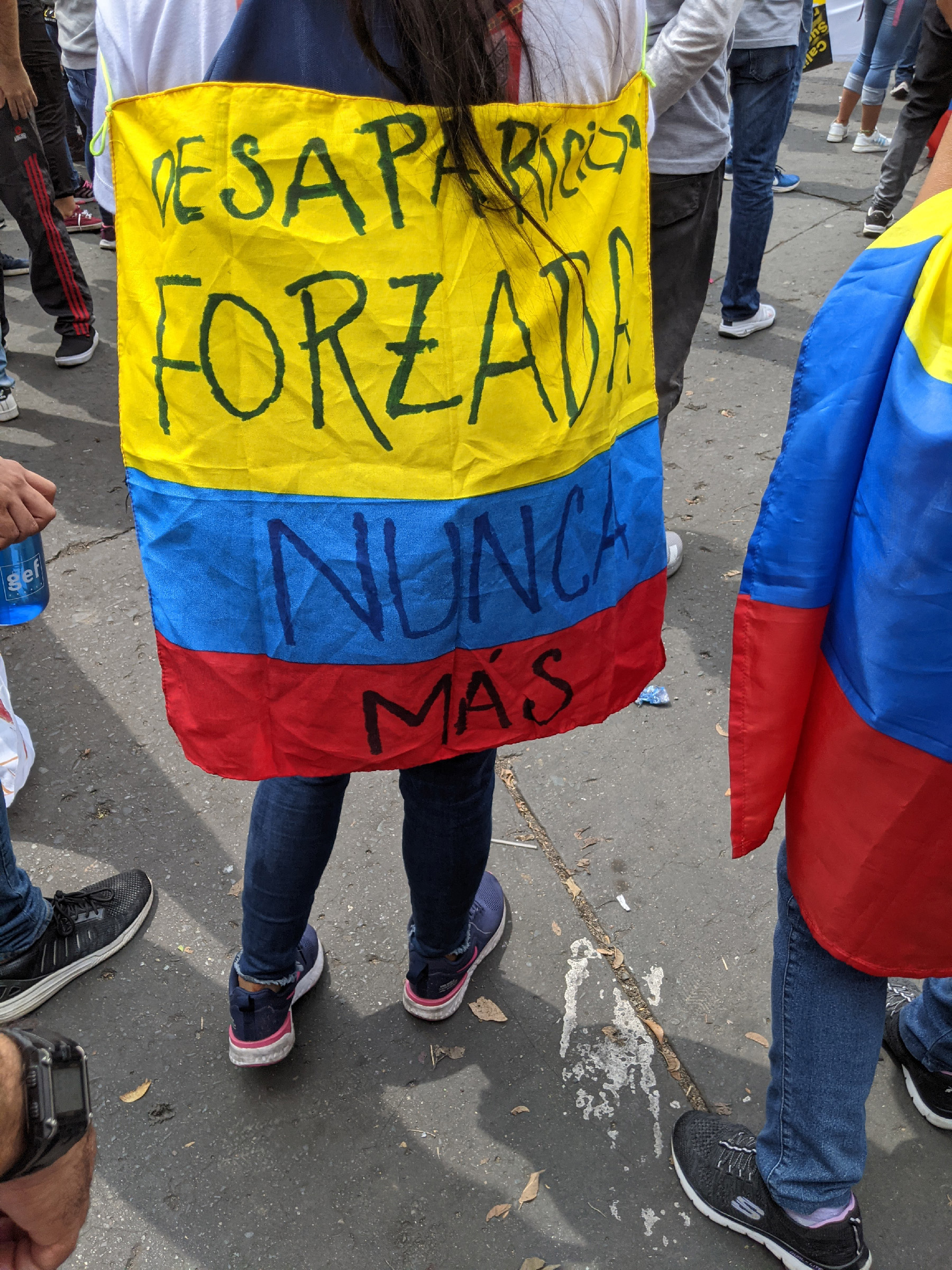 A Colombian flag reads, "Forced Disappearances Never Again," at the resistance point Siloé, Cali, Colombia, on May 28, 2021.