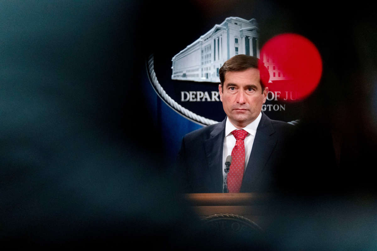 Assistant Attorney General for the National Security Division John Demers takes a question from a reporter via teleconference at a news conference at the Department of Justice, on October 19, 2020, in Washington, D.C.