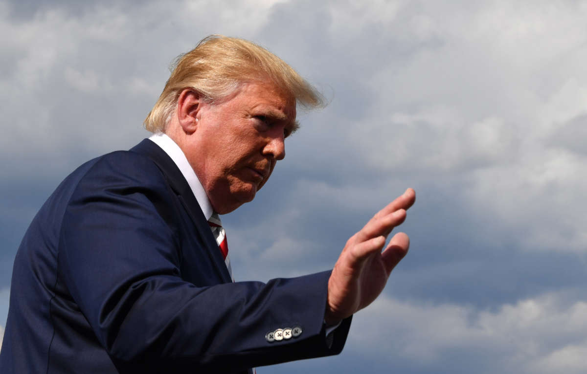 Then-President Donald Trump gives a statement at Morristown Airport on August 4, 2019.