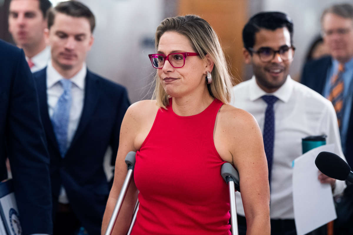Sen. Kyrsten Sinema arrives for a Senate Homeland Security and Governmental Affairs Committee markup in Dirksen Building on June 16, 2021.