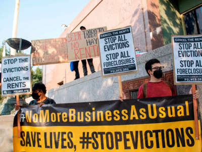 Renters and housing advocates attend a protest to cancel rent and avoid evictions in front of a court house on August 21, 2020, in Los Angeles, California.