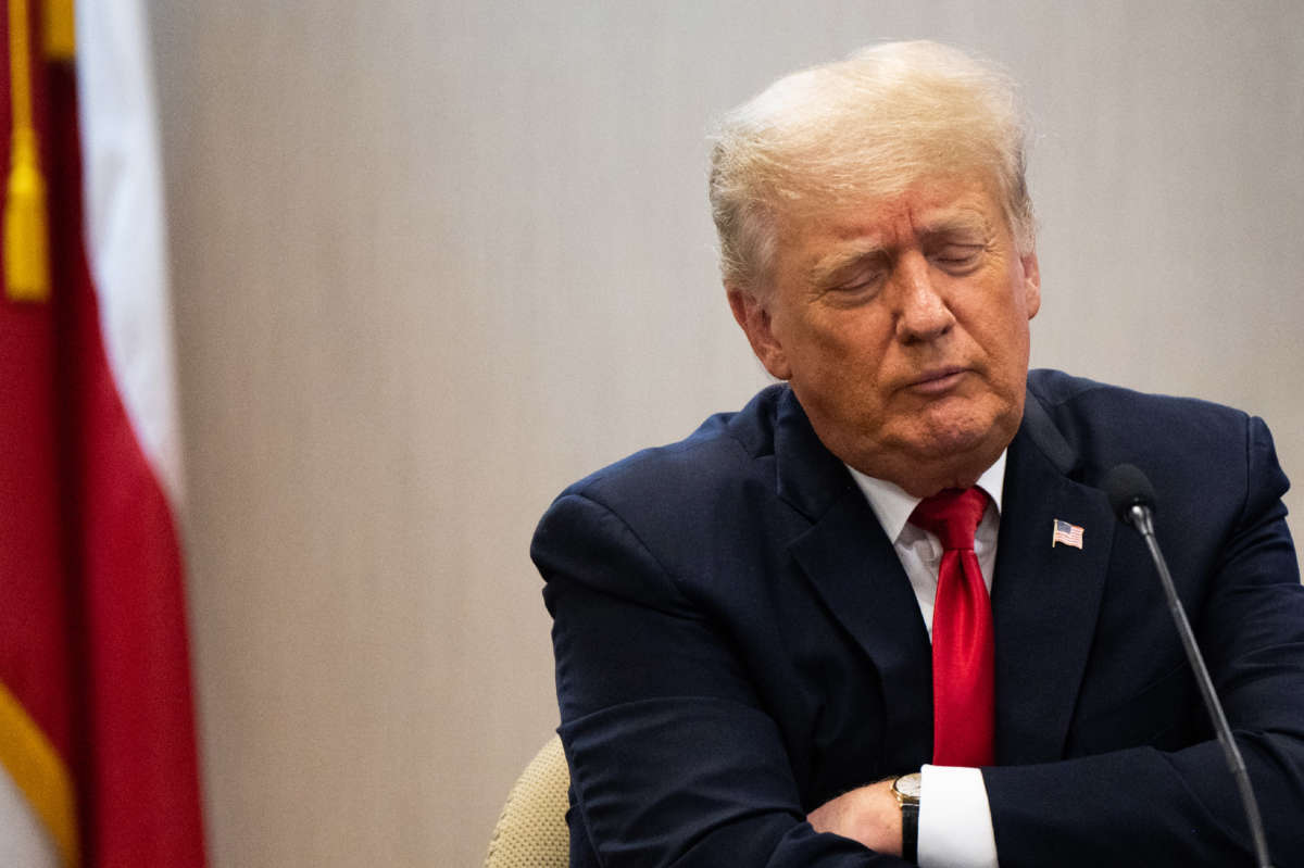 Former President Donald Trump listens during a border security briefing on June 30, 2021, in Weslaco, Texas.