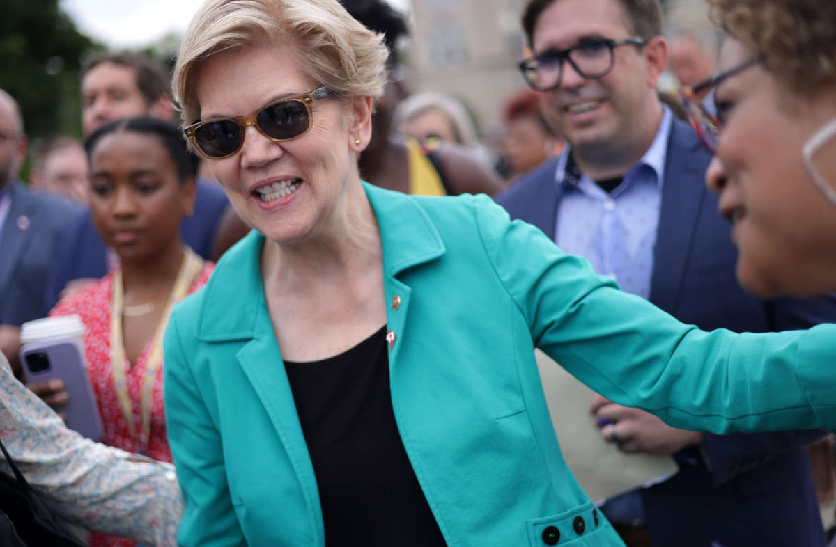 Sen. Elizabeth Warren greets supporters at a rally in front of the U.S. Supreme Court on June 9, 2021, in Washington, D.C.