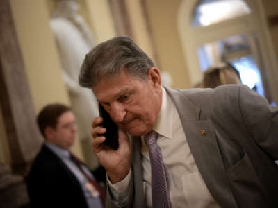 Sen. Joe Manchin arrives for a bipartisan meeting on infrastructure legislation at the U.S. Capitol on July 13, 2021, in Washington, D.C.