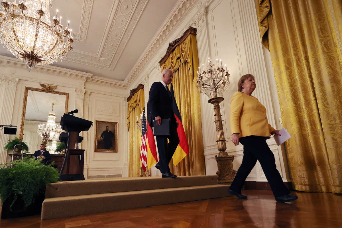 President Joe Biden and German Chancellor Angela Merkel leave a joint news conference in the East Room of the White House on July 15, 2021, in Washington, D.C.