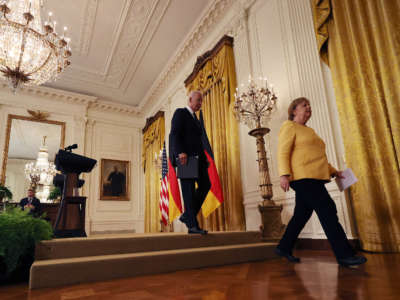 President Joe Biden and German Chancellor Angela Merkel leave a joint news conference in the East Room of the White House on July 15, 2021, in Washington, D.C.