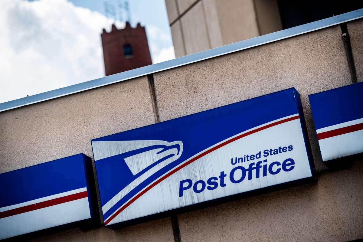 A sign outside the USPS Baltimore Processing and Distribution Center is pictured in Baltimore, Maryland, on August 17, 2020.