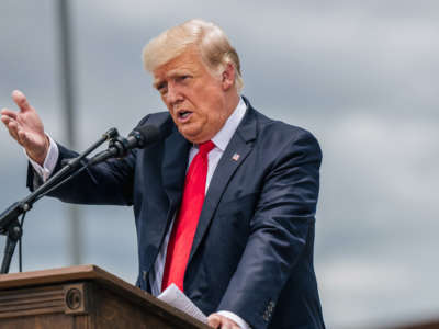 Former President Donald Trump speaks during a tour to an unfinished section of the border wall on June 30, 2021, in Pharr, Texas.