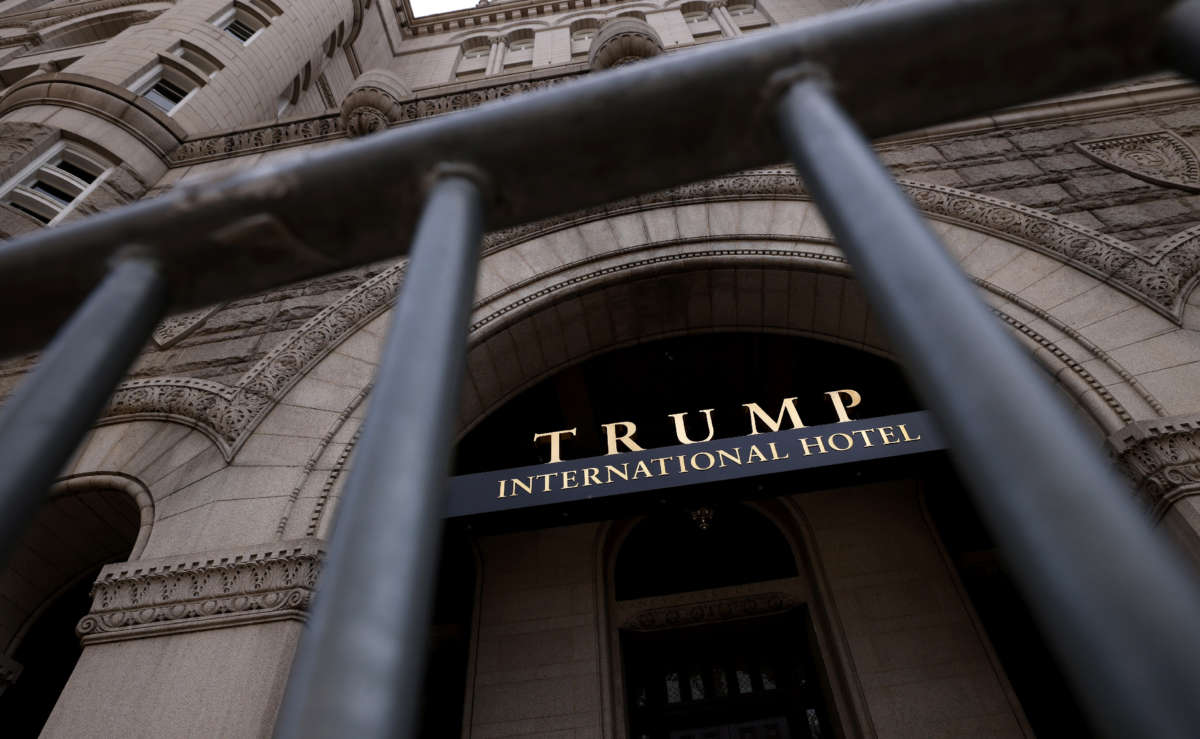 The Trump International Hotel is seen though security fencing on June 2, 2021, in Washington, D.C.