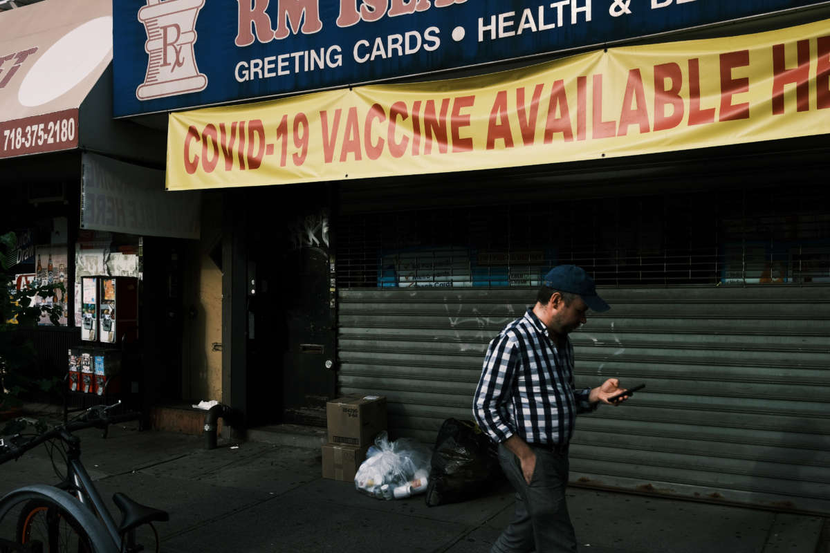 A pharmacy advertises the COVID-19 vaccine in a neighborhood near Brighton Beach on July 22, 2021, in the Brooklyn borough of New York City.