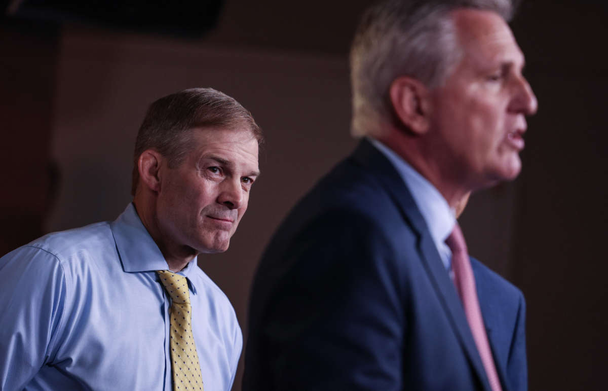 Rep. Jim Jordan, left, listens as House Minority Leader Kevin McCarthy speaks at a news conference on July 21, 2021, in Washington, D.C.