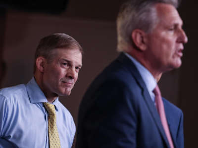 Rep. Jim Jordan, left, listens as House Minority Leader Kevin McCarthy speaks at a news conference on July 21, 2021, in Washington, D.C.