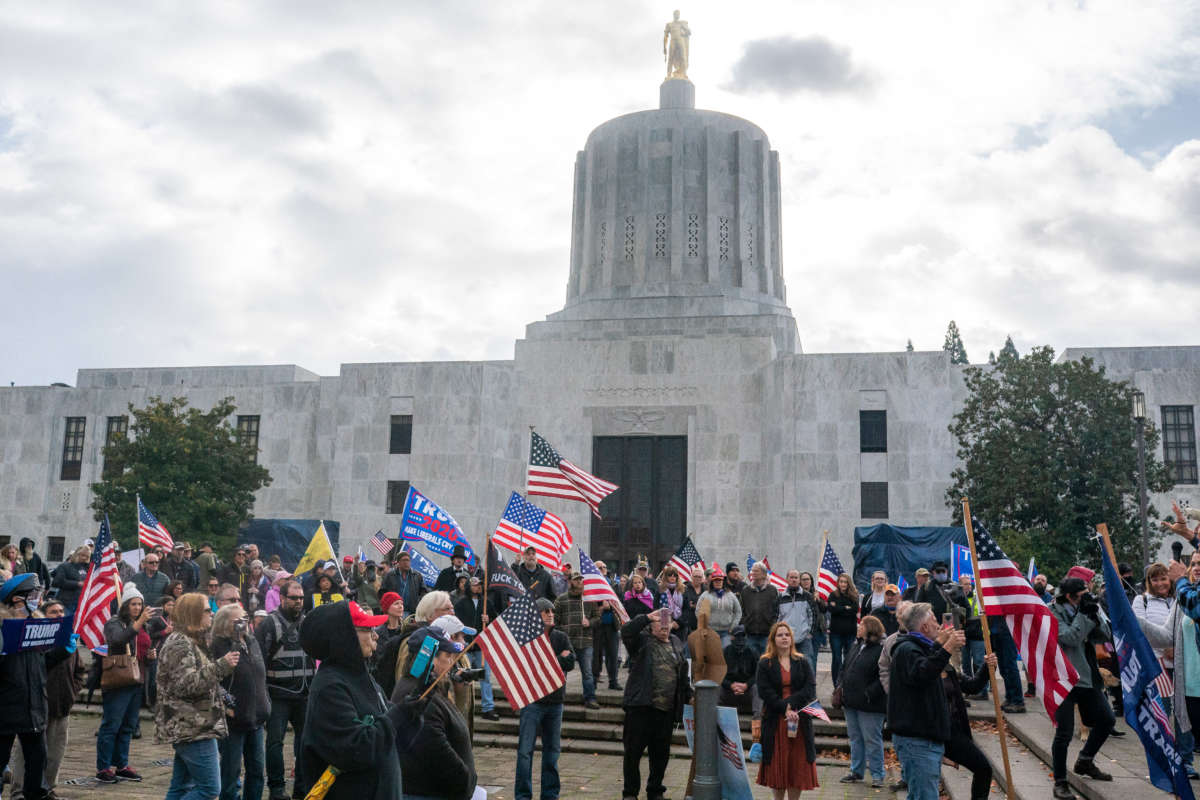 Protesters gather in front of the Oregon state capitol building during a "Stop the Steal" rally on November 7, 2020, in Salem, Oregon.