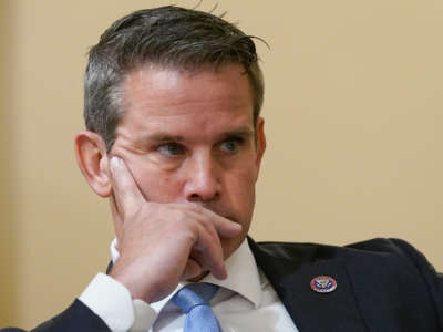Rep. Adam Kinzinger listens during the House Select Committee investigating the January 6 attack on the U.S. Capitol, on July 27, 2021, at the Cannon House Office Building in Washington, D.C.