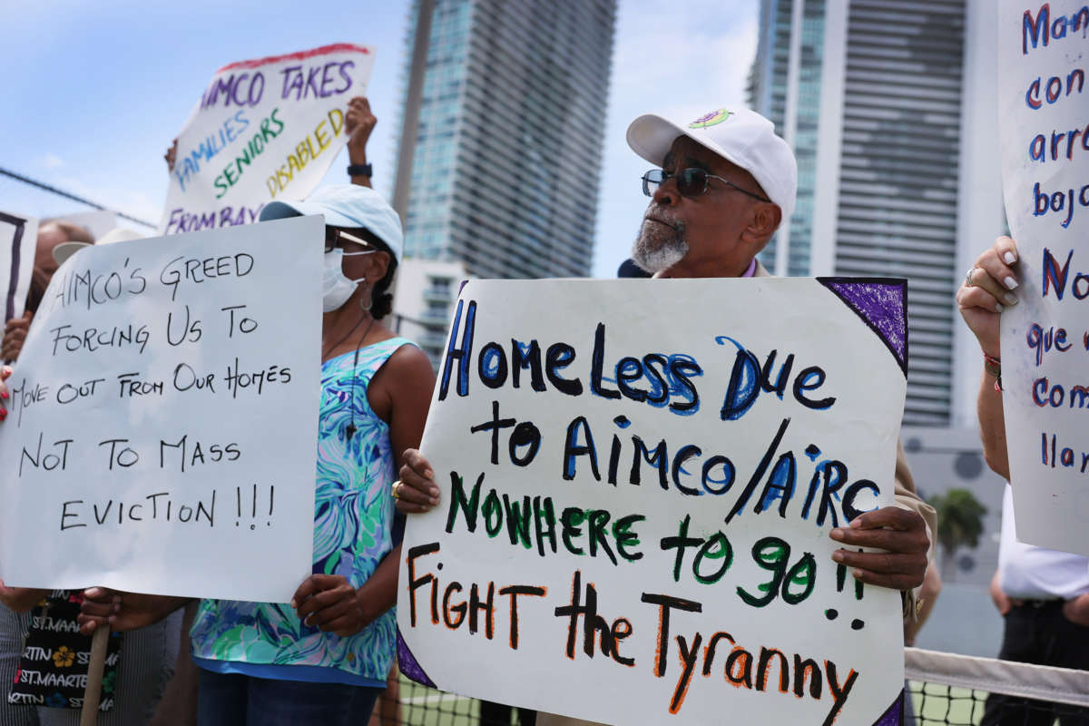 Dr. W. Dean Goldsby Sr. and other tenants of the Hamilton on the Bay apartment building protest eviction notices on June 8, 2021, in Miami, Florida.