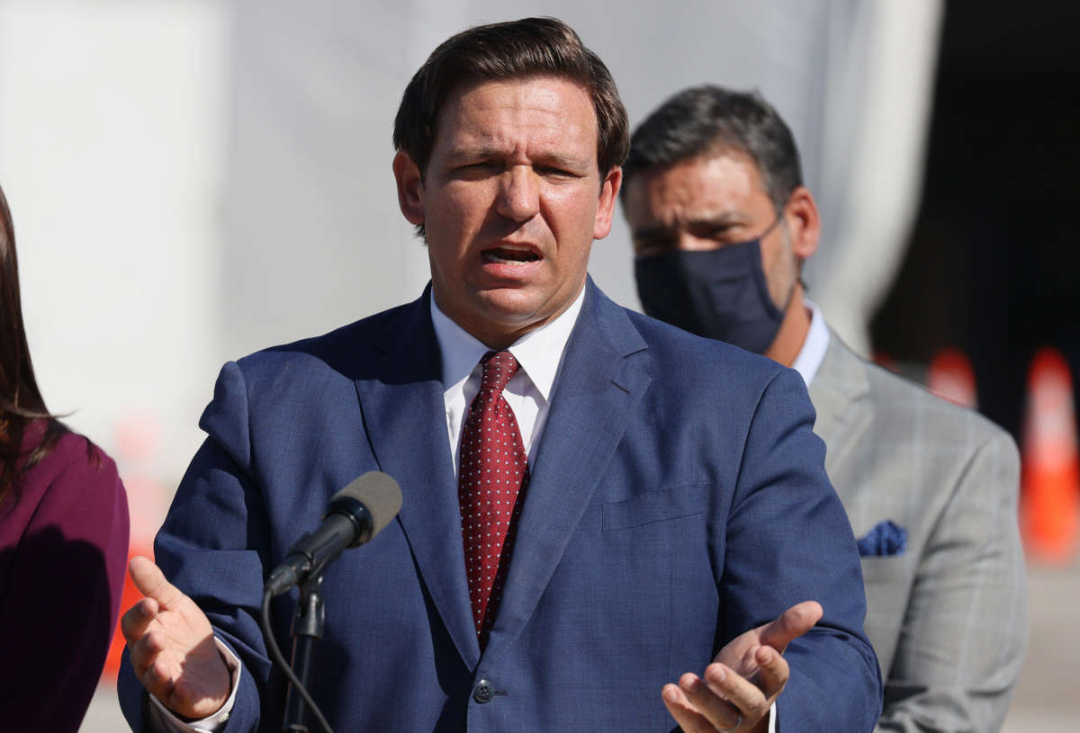 Florida Gov. Ron DeSantis speaks during a press conference about the opening of a COVID-19 vaccination site at the Hard Rock Stadium on January 6, 2021, in Miami Gardens, Florida.