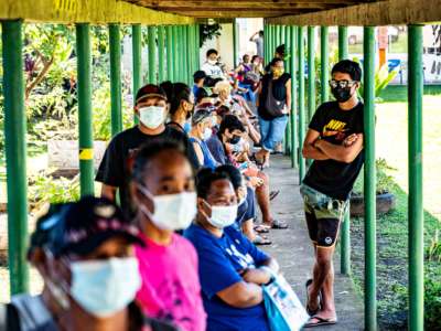 People line up to recieve the covid-19 vaccine