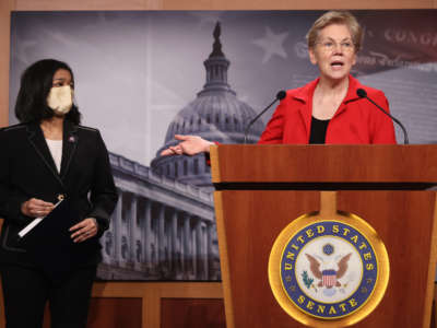 Sen. Elizabeth Warren holds a news conference with Rep. Pramila Jayapal to announce legislation at the U.S. Capitol on March 1, 2021, in Washington, D.C.