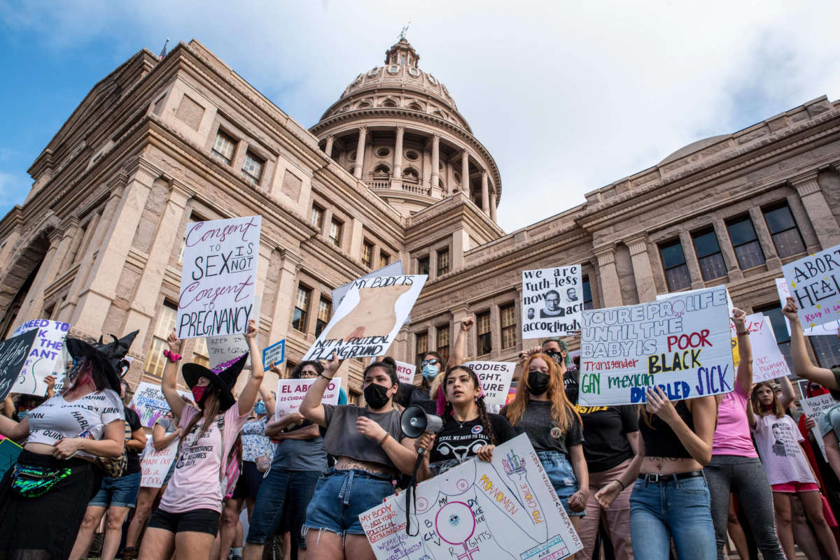 Protesters take part in the Women's March and Rally for Abortion Justice at the State Capitol in Austin, Texas, on October 2, 2021.