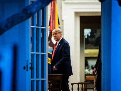 President Donald Trump talks with others in the Oval Office at the White House on November 13, 2020, in Washington, D.C.