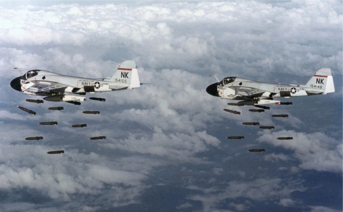 Two US Navy Grumman A-6A Intruder aircraft drop bombs over Vietnam, December 20, 1968. American exceptionalism implicitly includes the notion that the US excels at making war.