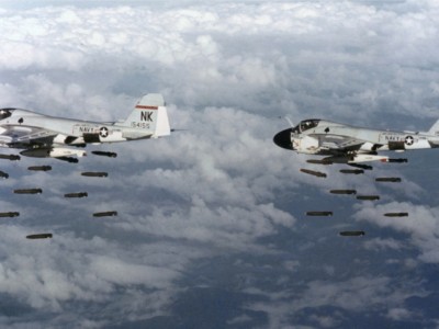 Two US Navy Grumman A-6A Intruder aircraft drop bombs over Vietnam, December 20, 1968. American exceptionalism implicitly includes the notion that the US excels at making war.