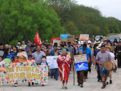 Rio Grande Valley residents, including Native and environmental activists, participate in an annual climate march and rally on March 3, 2019, protesting the border wall’s impacts on the land and wildlife in the area.