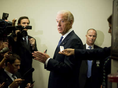 President Joe Biden talks to reporters in the Capitol Visitor Center after a meeting with the House Democratic Caucus on the ongoing debt ceiling talks.