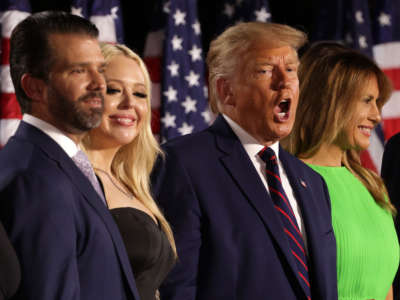 Donald Trump screams while surrounded by his hideous family