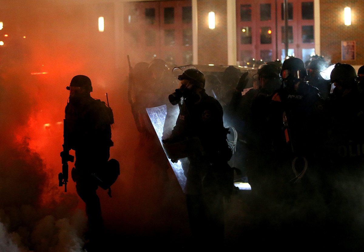 Police deploy tear gas on protesters during a demonstration on November 24, 2014, in Ferguson, Missouri.