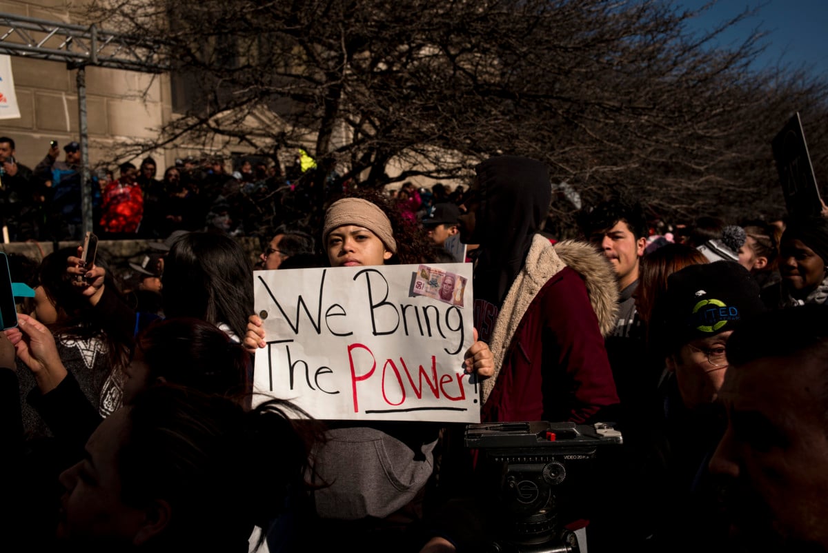 Protestors gather at the Milwaukee County Courthouse where they attend a rally against President Donald Trump's policies on immigration, February 13, 2017, in Milwaukee, Wisconsin.