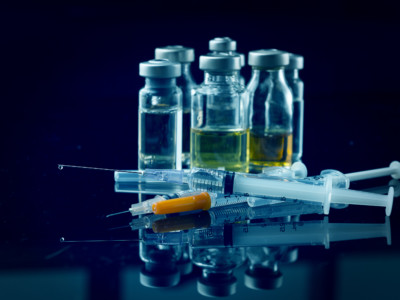 Close up shot syringe and Vial bottle with black background medical equipment concept