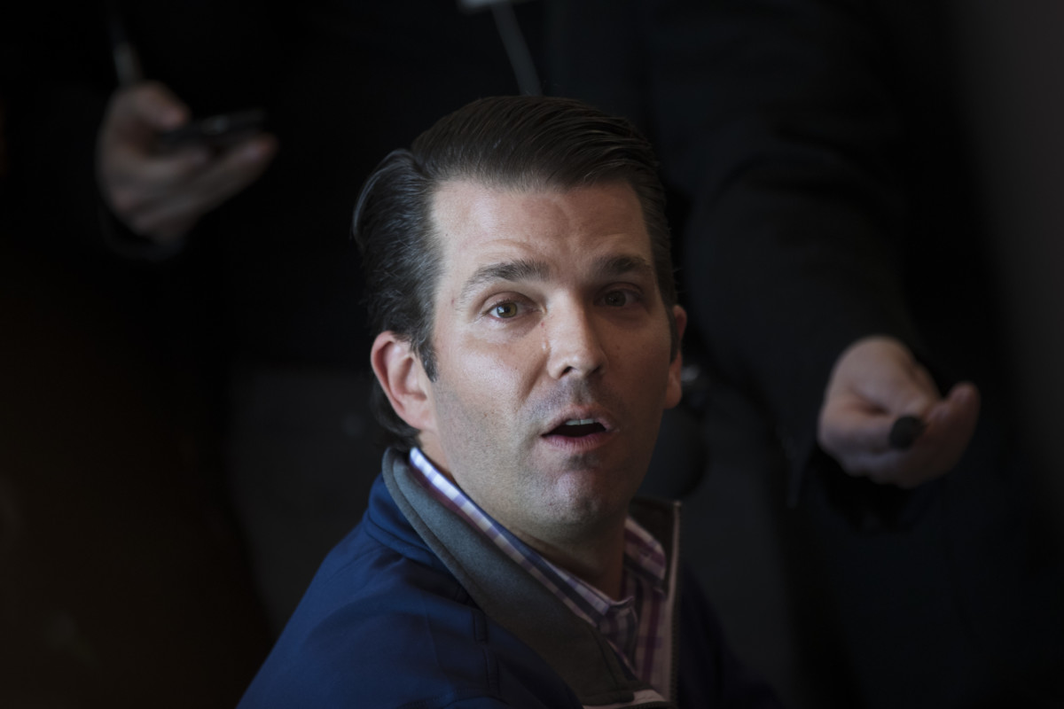 Donald Trump Jr. answers questions from reporters while touring Sarris Candies with Rick Saccone, Republican congressional candidate for Pennsylvania's 18th district, March 12, 2018, in Cannonsburg, Pennsylvania.