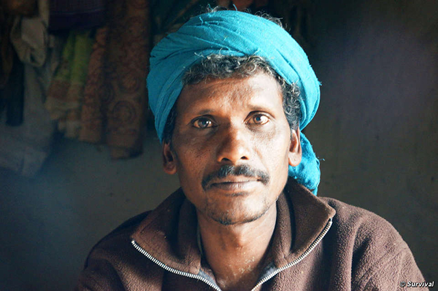 This man’s whole community was evicted from Kanha Tiger Reserve. Villagers report that guards threatened to release elephants on them. (PHoto: © Survival)