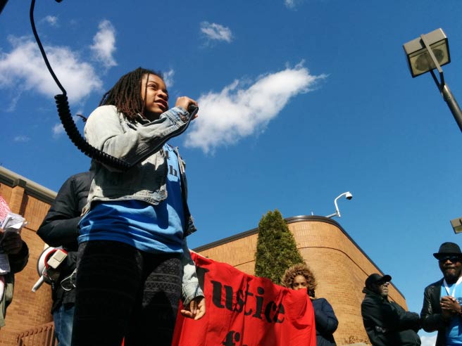 VLA student Jakya Hobbs speaks out on the lawn of the Calumet City police station. (Photo: Kelly Hayes)
