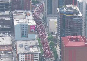 Thousands rally in the streets of down town Seattle to demand full funding of the Washington State schools.