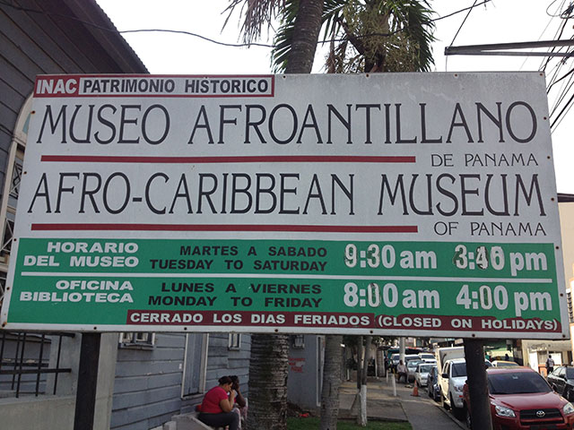 The sign for the entrance to The West Indian Museum of Panama. The edits to the sign have been done such that it is not entirely clear what the numbers read. SAMAAP, the Society of Friends of the Museum, feels the Panamanian government has allocated insufficient funds to maintain the museum. (Photo: Zach Borenstein)